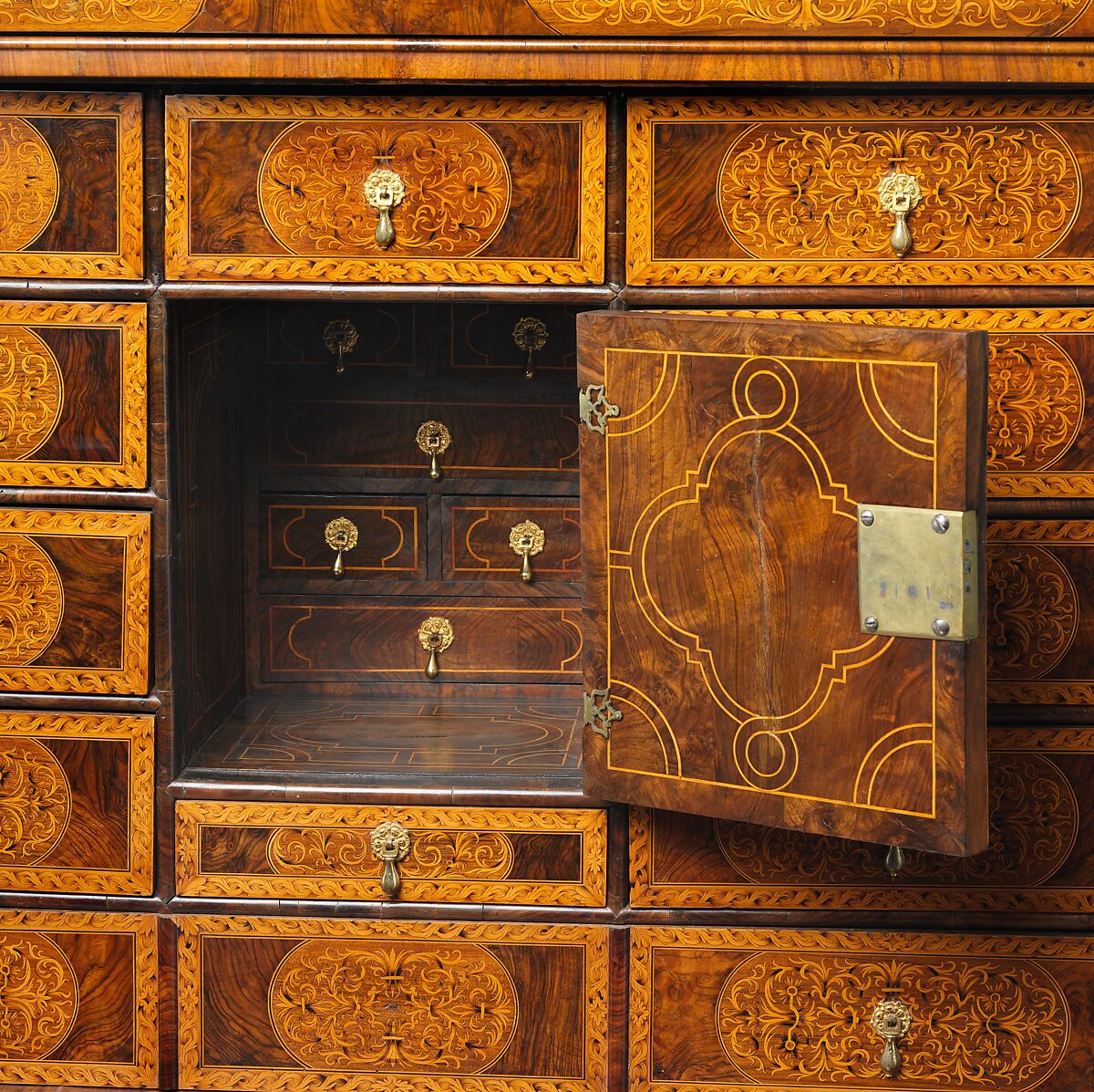 Cabinet on stand, Pine veneered with marquetry of walnut, burl walnut, holly; oak drawers; walnut legs; brass hardware, some of it replaced, British