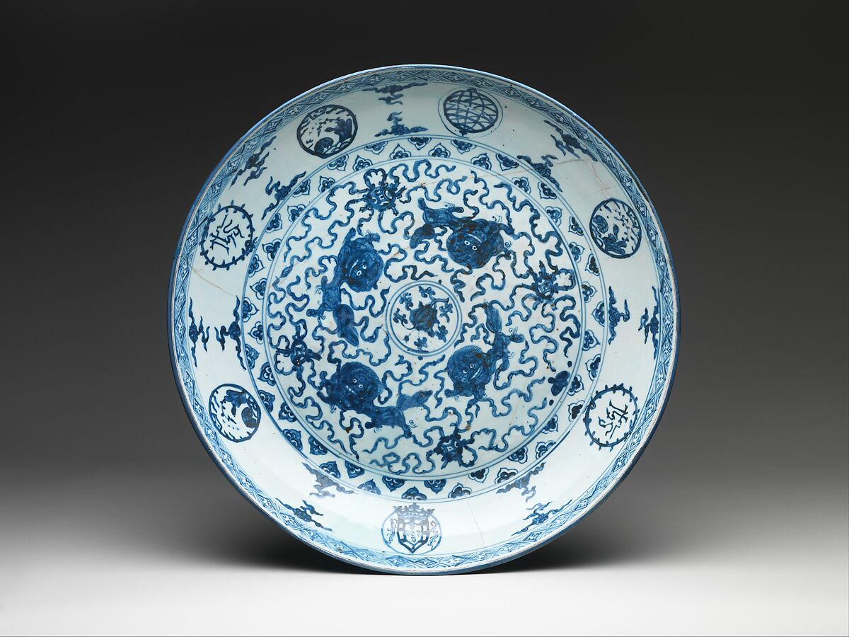 Dish with IHS monogram, armillary sphere, and Portuguese royal arms, Hard-paste porcelain with underglaze cobalt blue decoration (Jingdezhen ware), Chinese, for Portuguese market