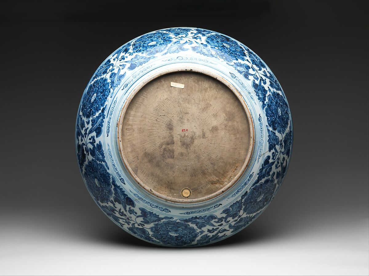 Dish with IHS monogram, armillary sphere, and Portuguese royal arms, Hard-paste porcelain with underglaze cobalt blue decoration (Jingdezhen ware), Chinese, for Portuguese market