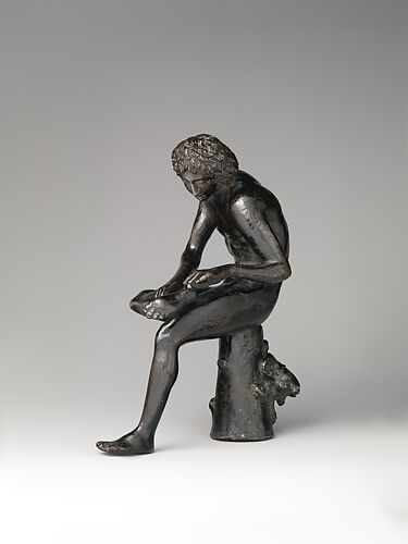 Spinario (boy pulling a thorn from his foot)