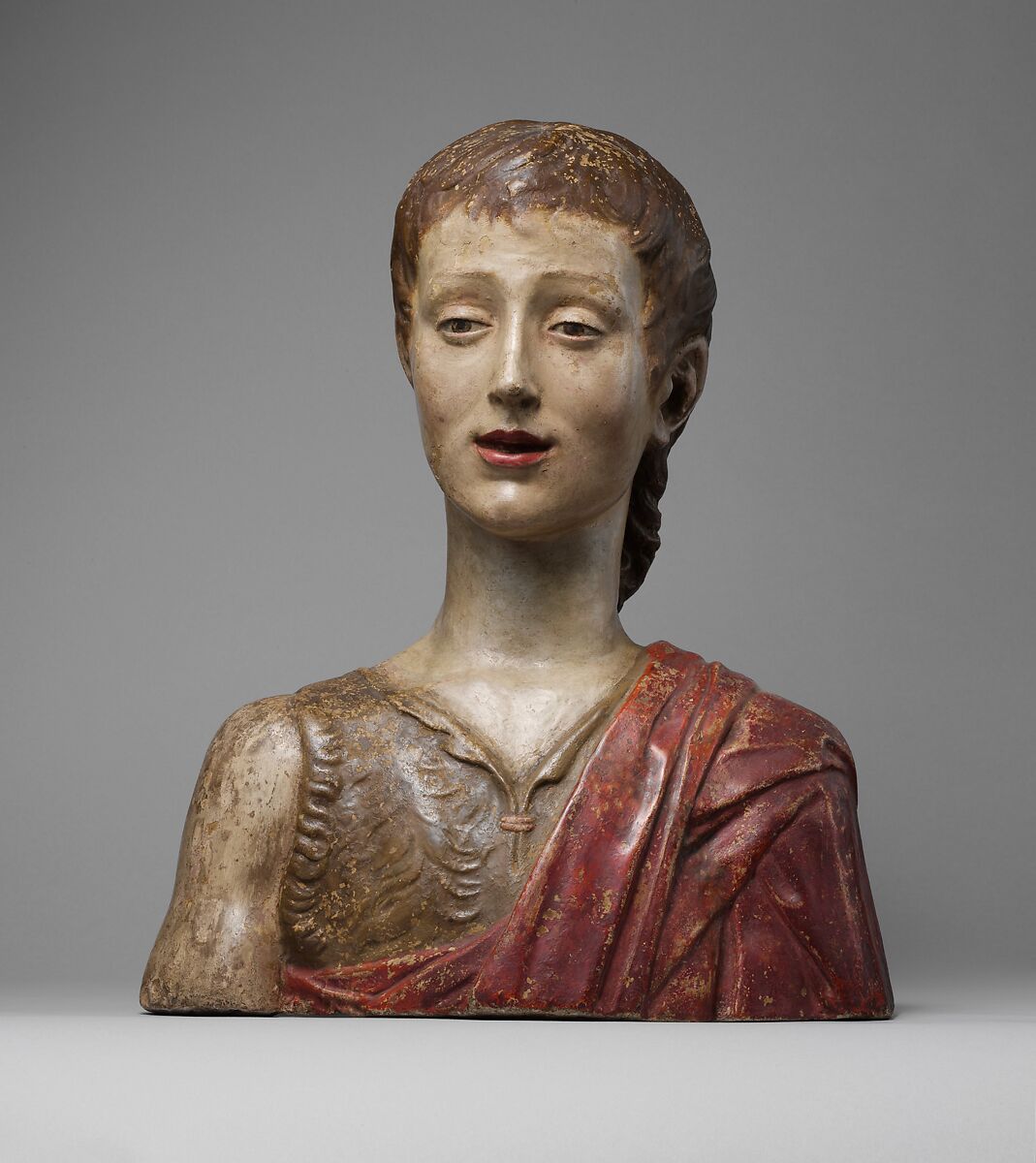 Saint John the Baptist, Follower of Mino da Fiesole (Mino di Giovanni) (Italian, Papiano or Montemignaio 1429–1484 Florence), Bust: stucco, polychromed; base: gilt wood, Italian, Florence 