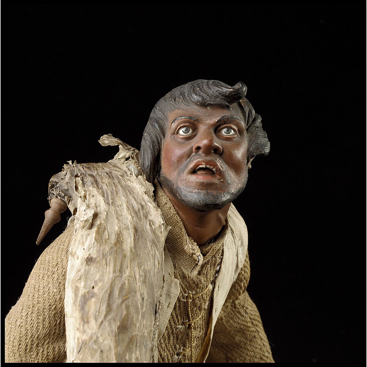 Man carrying bagpipes, Polychromed terracotta and wood; cloth, straw and leather, Italian, Naples