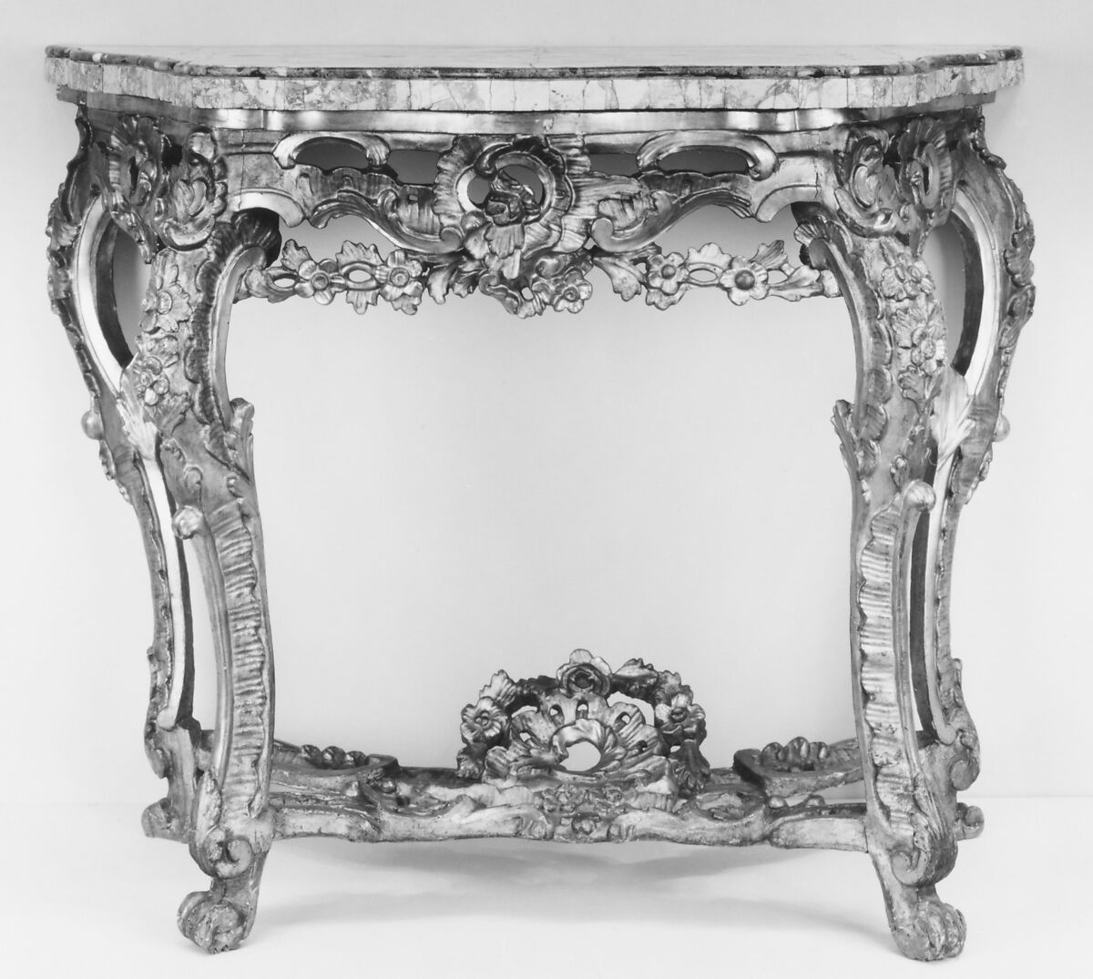 Console table, Wood, carved and gilded with sarrancolin and vert-de-mer marble top, Italian, Rome 