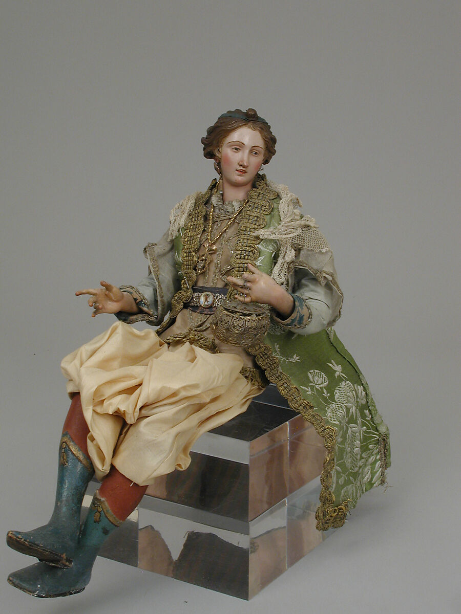 Lady seated in a howdah, Polychromed terracotta head; wooden limbs; body of wire wrapped in tow; various fabrics; silver, Italian, Naples 