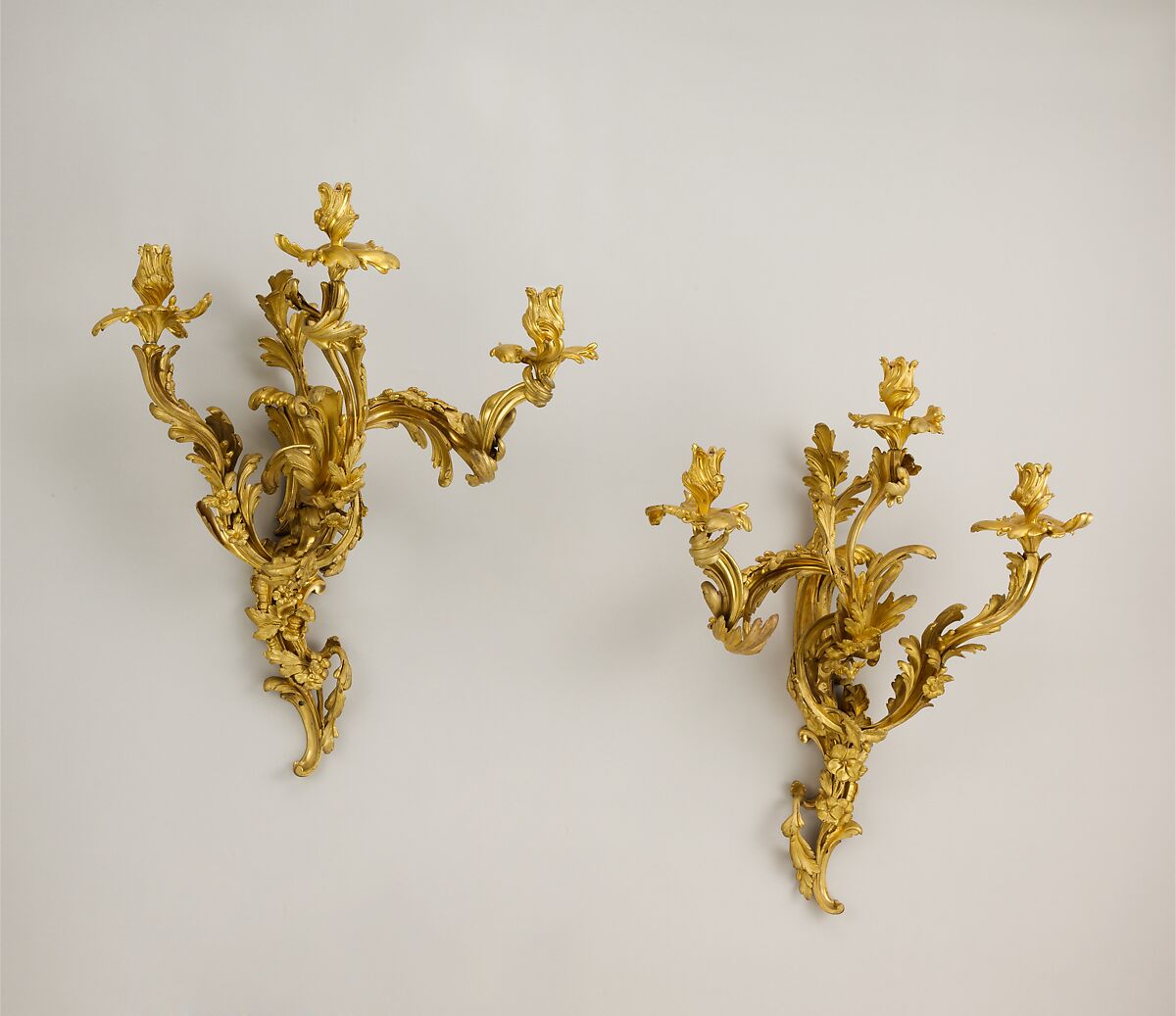 Set of four three-light sconces (bras de lumière), Gilt bronze, French, Paris 