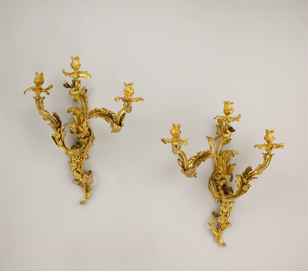 Set of four three-light sconces (bras de lumière), Gilt bronze, French, Paris