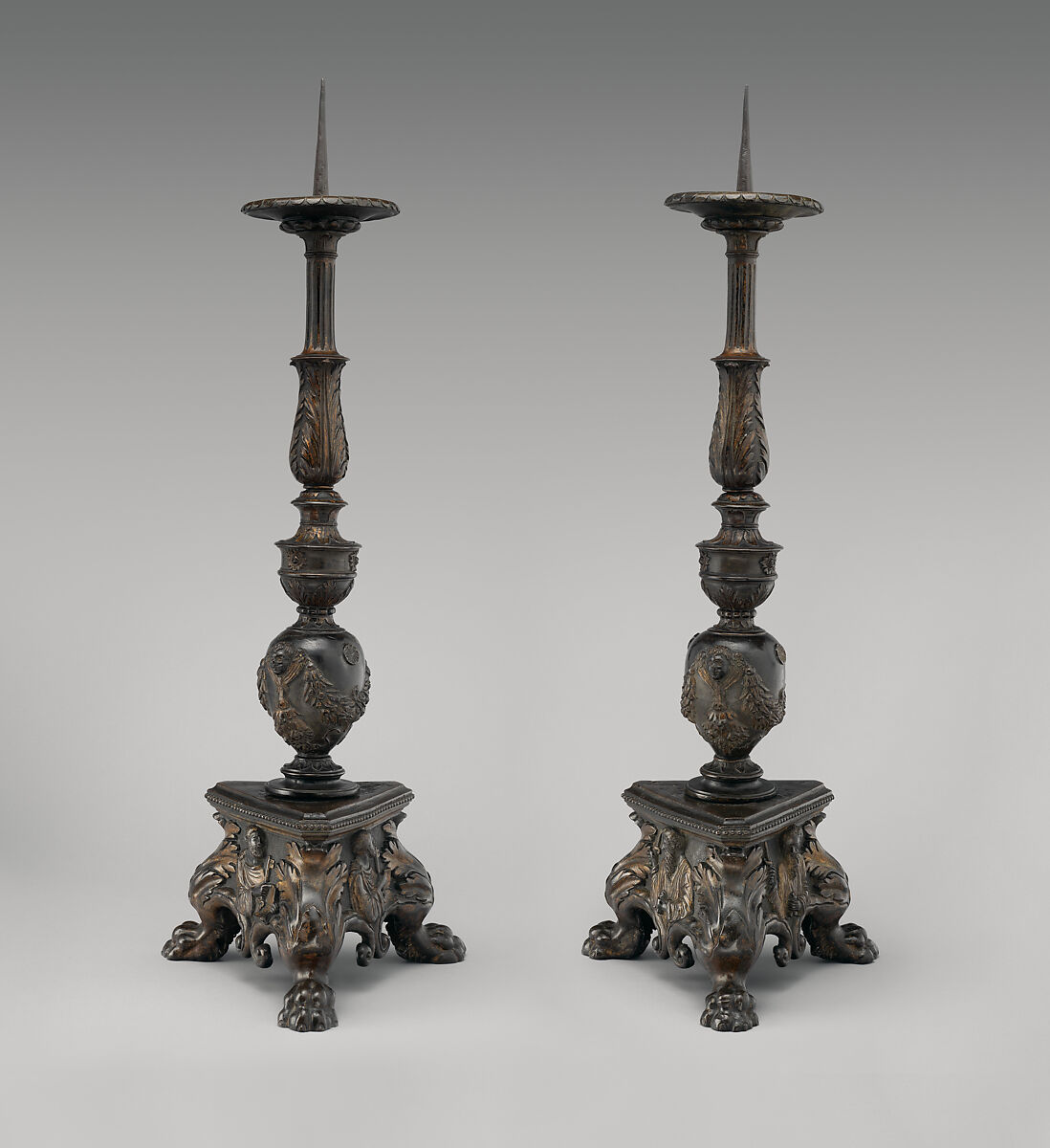 Altar candlestick with busts in relief of Saints Peter and Paul (one of a pair), Workshop of Vincenzo Grandi (mentioned 1507–1577/78), Bronze, partially oil-gilt, Northern Italian