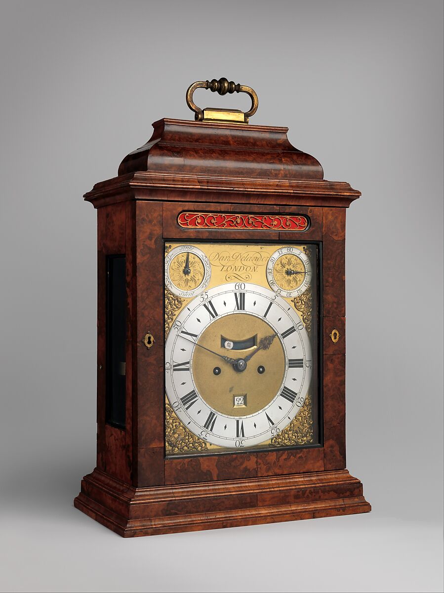 Table or bracket clock with calendar, Clockmaker: Daniel Delander (British, 1678–1733), Case: walnut, oak veneered with walnut and burl walnut; stained wooden moldings; and brass fittings; Dial: gilded and silvered brass; Movement: brass and steel, British, London 