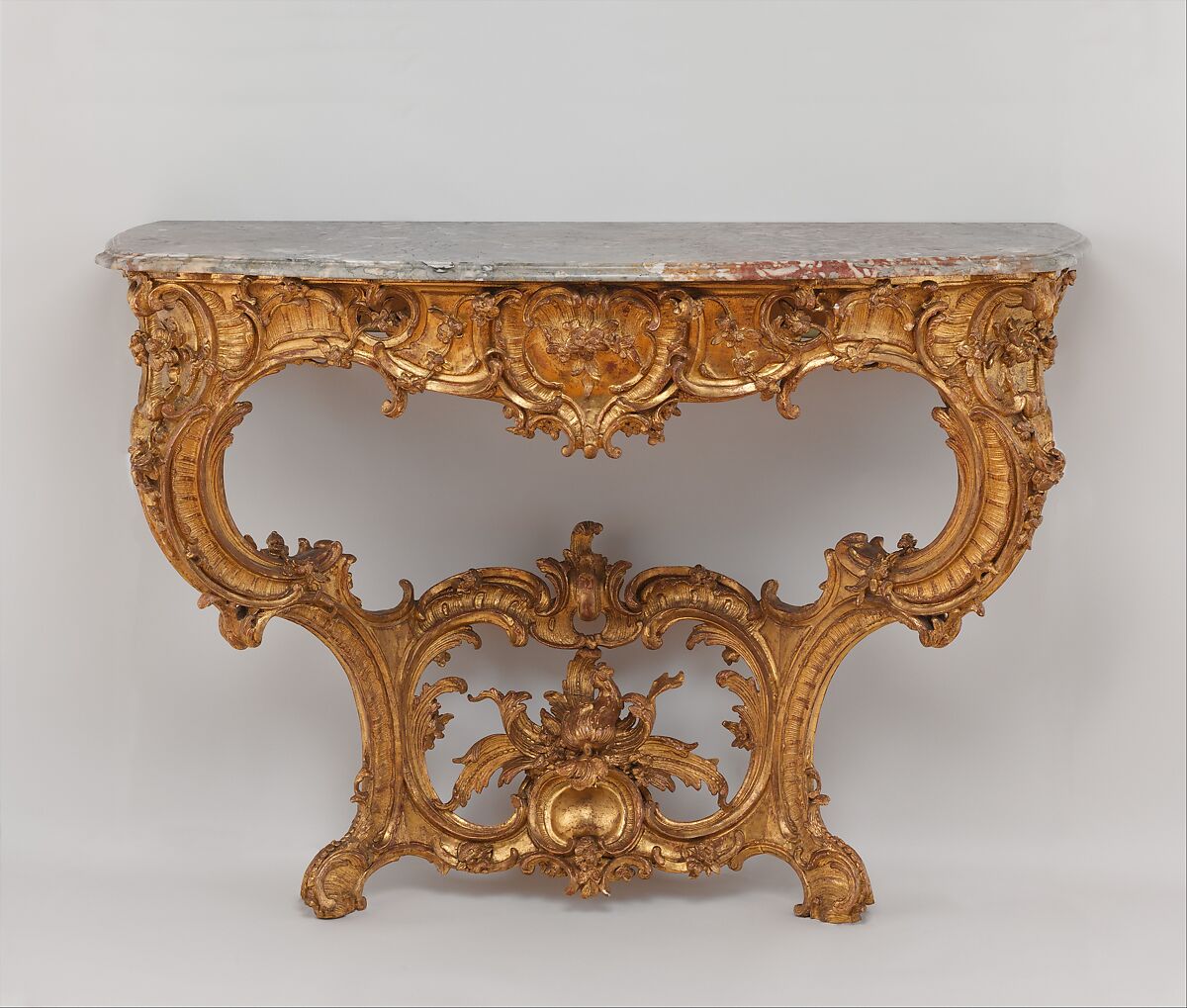 Console table, Carved and gilded oak and limewood; legs and apron of oak; double stretcher of linden wood; greenish gray and reddish brecciated marble top, German, Bayreuth 