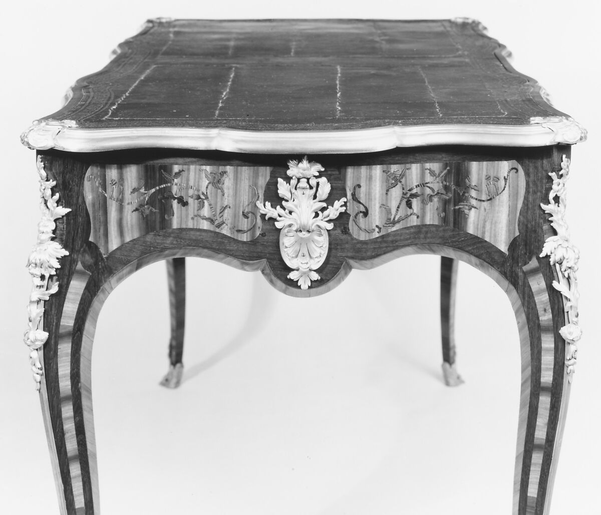 Writing table (bureau plat), Bernard II van Risenburgh (ca. 1696–ca. 1767), Satiné wood, purplewood and kingwood, gilt bronze, leather, French, Paris