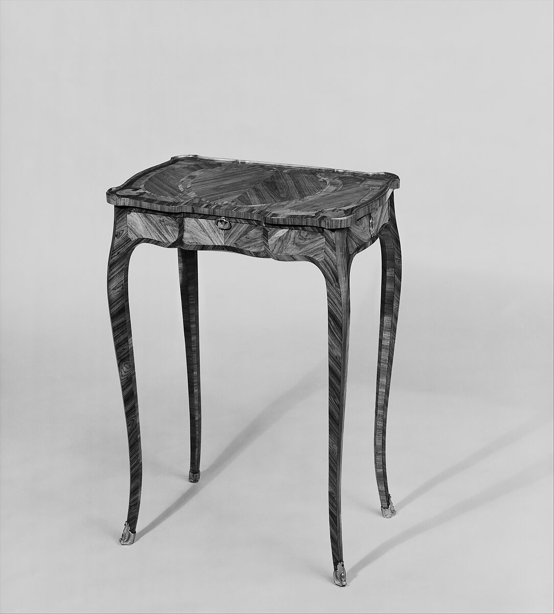 Small rectangular table, Léonard Boudin (French, 1735–1807, master 1761), Oak and pine carcass with tulipwood and kingwood veneer; leather and brass, French, Paris 