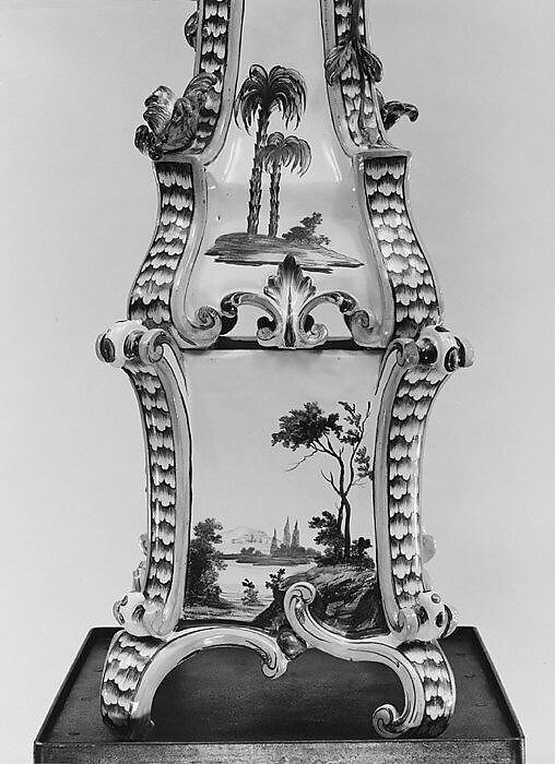 Ceramic stove on cast-iron firebox (one of a pair), Tin-glazed earthenware, gilt (worn), German, Stockelsdorf