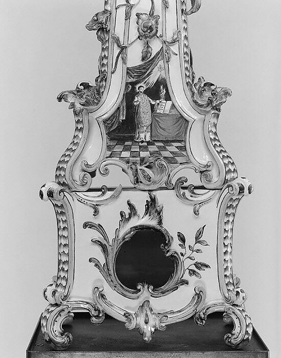 Ceramic stove on cast-iron firebox (one of a pair), Tin-glazed earthenware, gilt (worn), German, Stockelsdorf