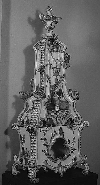 Ceramic stove on cast-iron firebox (one of a pair), Tin-glazed earthenware, gilt (worn), German, Stockelsdorf