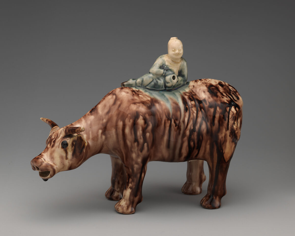 Water buffalo and reclining Chinese figure (one of a pair), Style of Whieldon type, Tortoiseshell ware (glazed earthenware), British, Staffordshire