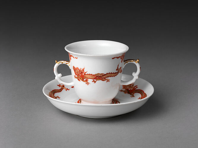 Chocolate cup and saucer with dragons and phoenixes