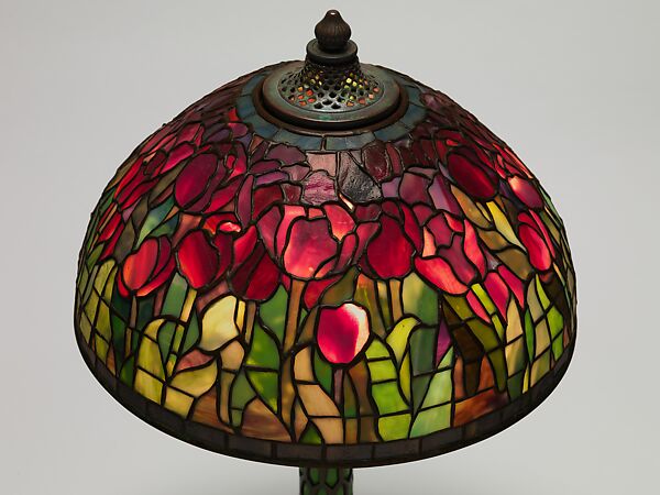 "Tulip" lamp, Tiffany Studios (1902–32), Leaded Favrile glass and patinated bronze with a reticulated blown glass base, American