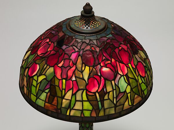 "Tulip" lamp, Tiffany Studios (1902–32), Leaded Favrile glass and patinated bronze with a reticulated blown glass base, American