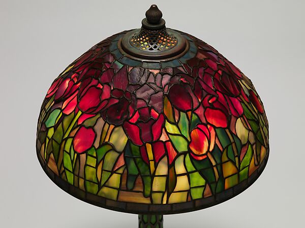 "Tulip" lamp, Tiffany Studios (1902–32), Leaded Favrile glass and patinated bronze with a reticulated blown glass base, American