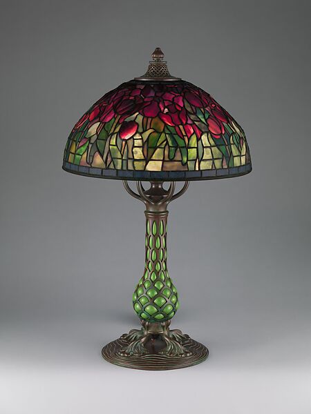 "Tulip" lamp, Tiffany Studios (1902–32), Leaded Favrile glass and patinated bronze with a reticulated blown glass base, American 