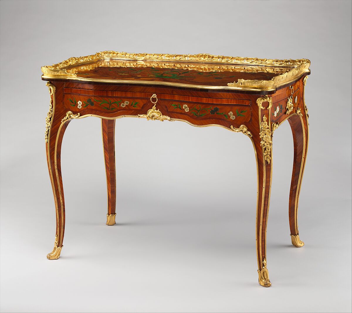 Writing table (table à écrire), Bernard II van Risenburgh (ca. 1696–ca. 1767), Oak veneered with tulipwood, kingwood, amaranth, mahogany, ebony, mother-of-pearl, stained horn; gilt-bronze mounts; modern velvet, French, Paris 