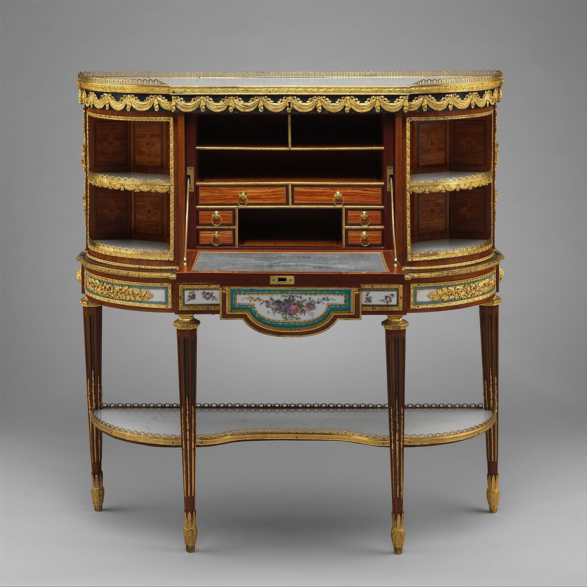 Drop-front desk (secrétaire à abattant or secrétaire en cabinet), Attributed to Martin Carlin (French, near Freiburg im Breisgau ca. 1730–1785 Paris), Oak veneered with tulipwood, amaranth, holly, and sycamore; six Sèvres soft-paste porcelain plaques and two painted tin plaques; gilt-bronze mounts; marble shelves; moiré silk, French, Paris and Sèvres