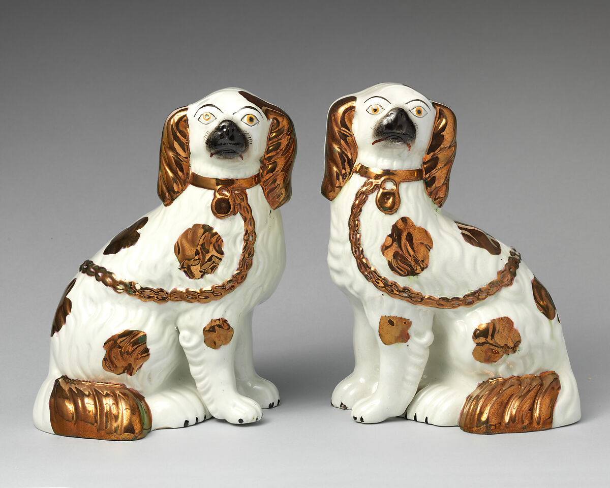 Pair of spaniels, Lead-glazed earthenware with copper lustre embellishments, British, Staffordshire 
