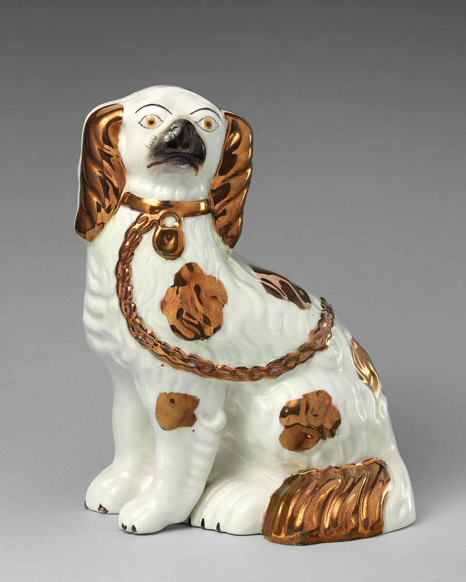 Pair of spaniels, Lead-glazed earthenware with copper lustre embellishments, British, Staffordshire