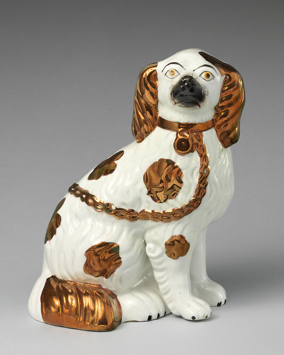Pair of spaniels, Lead-glazed earthenware with copper lustre embellishments, British, Staffordshire