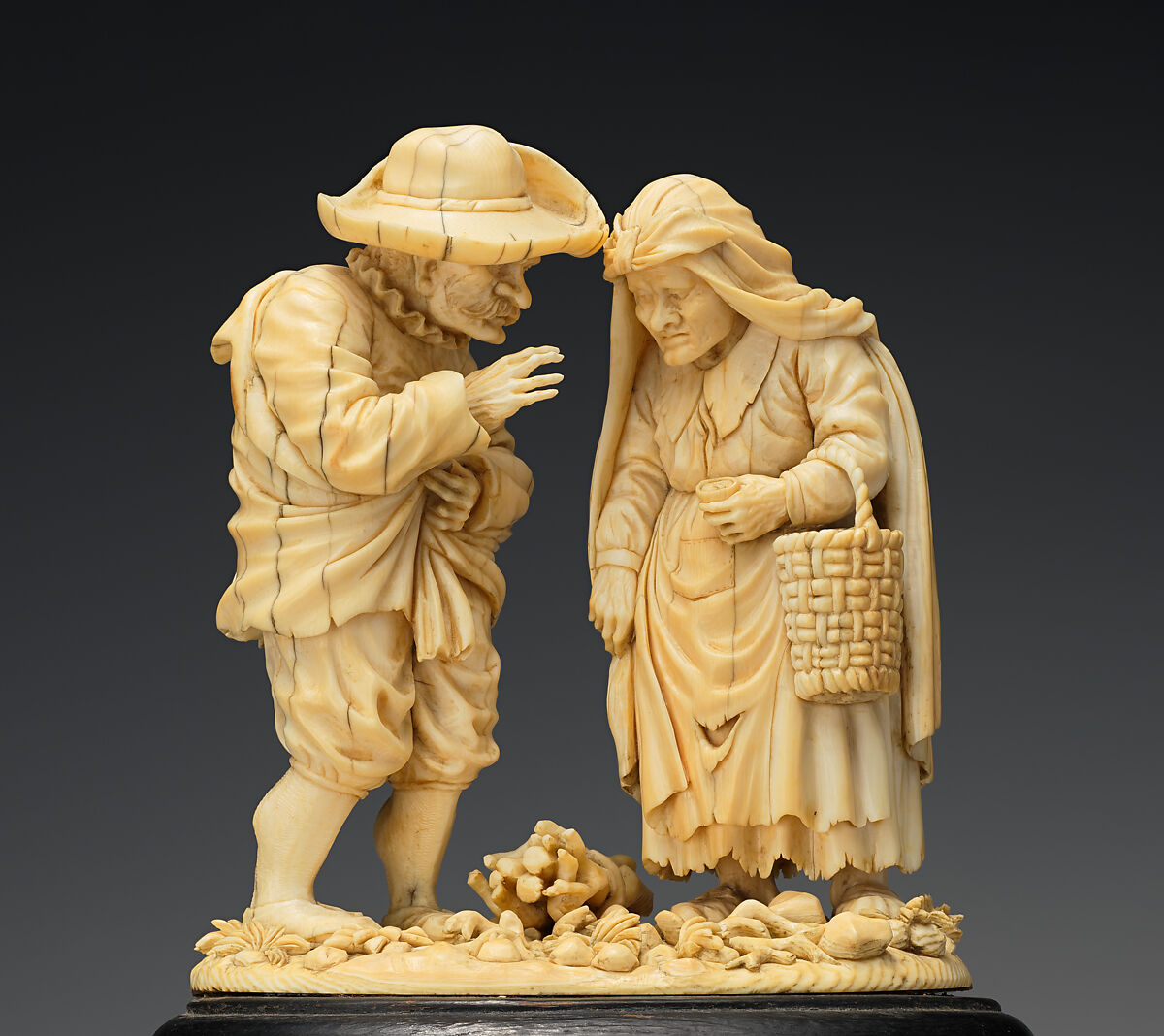 Old Peasant Couple, Ivory, carved wood pedestal, German