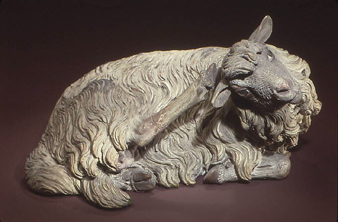 Reclining sheep, Polychromed terracotta body; wooden ears and raised leg, Italian, Naples