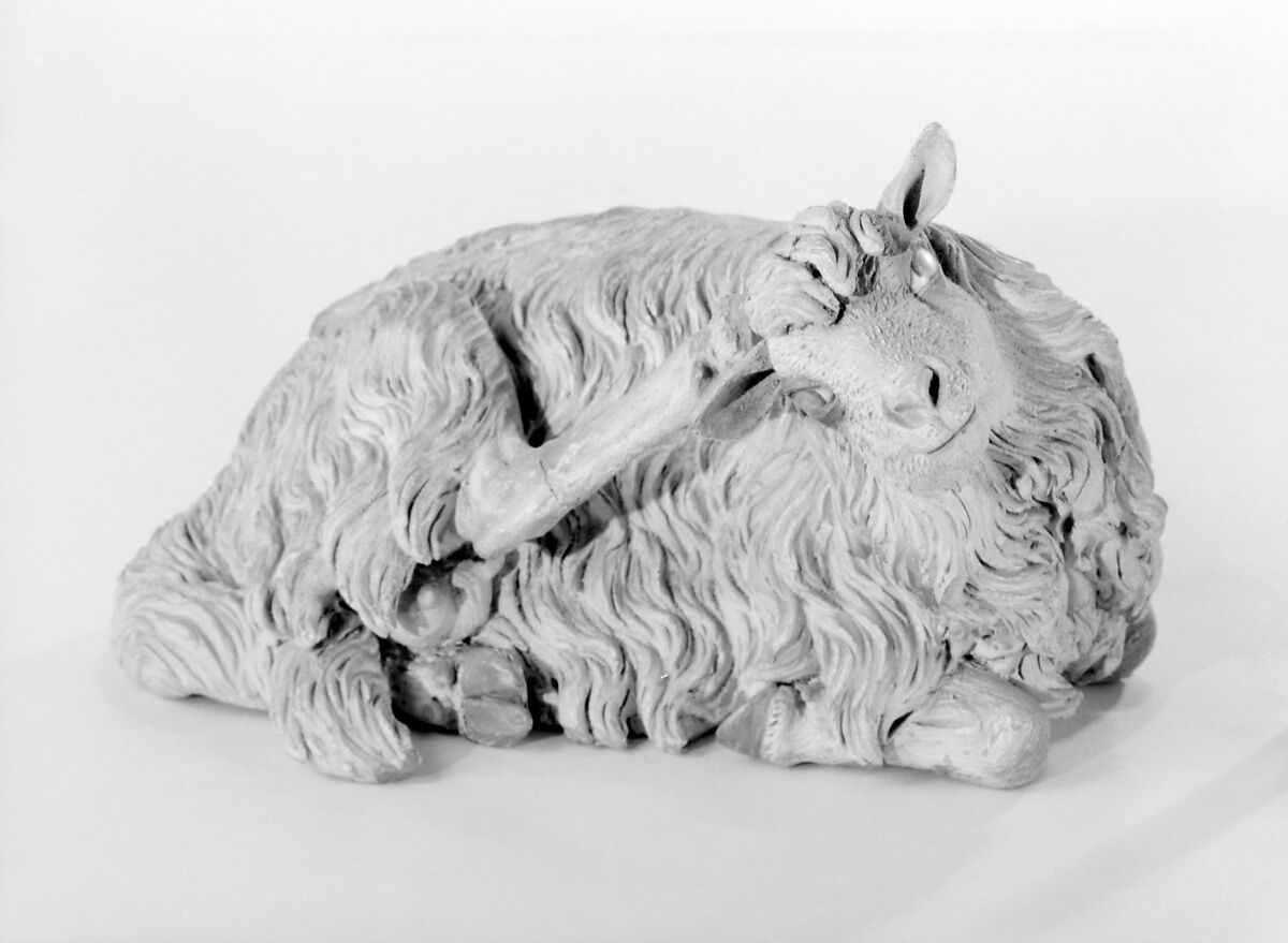 Reclining sheep, Polychromed terracotta body; wooden ears and raised leg, Italian, Naples