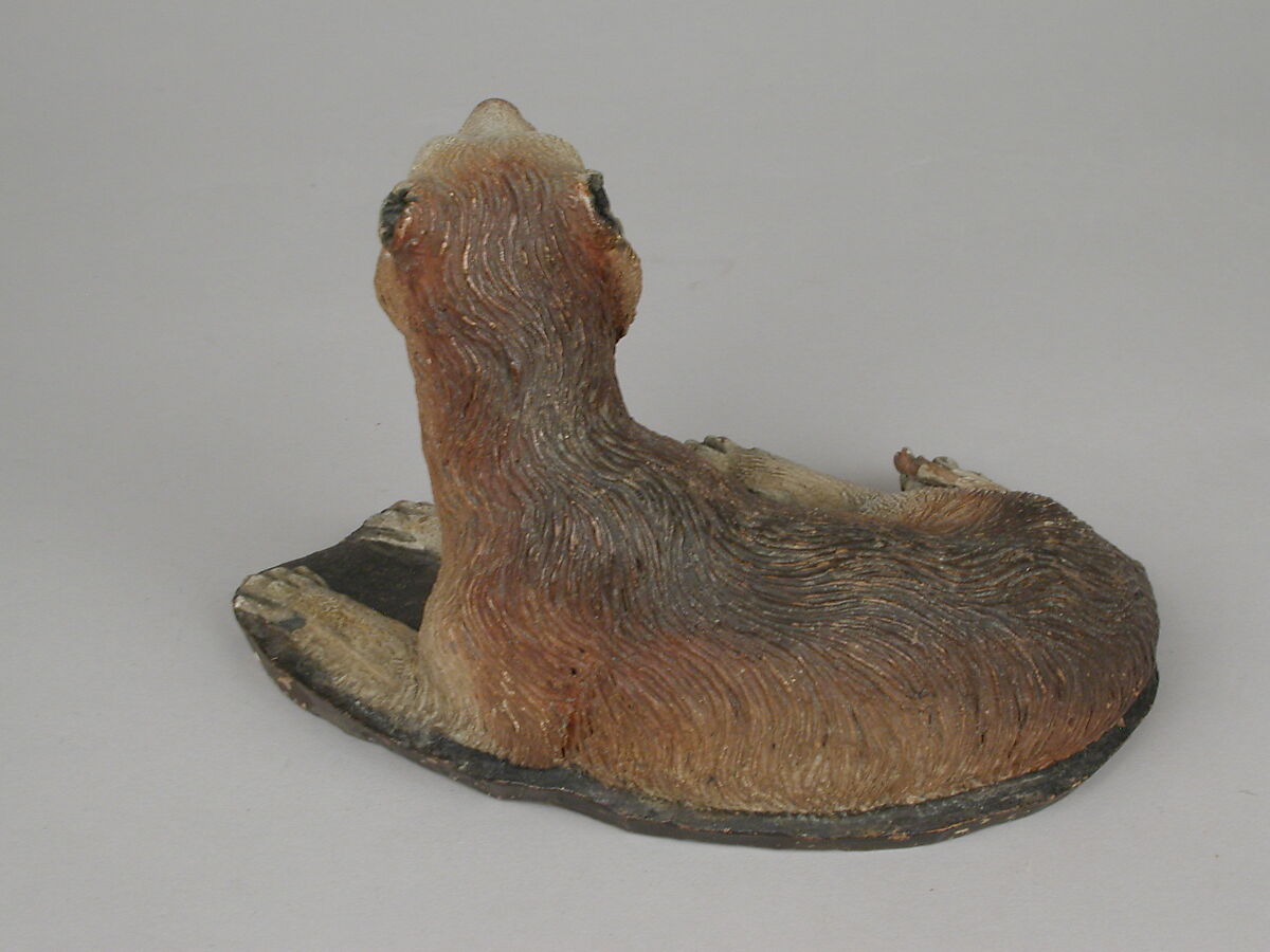 Reclining sheepdog, Polychromed terracotta body, Italian, Naples