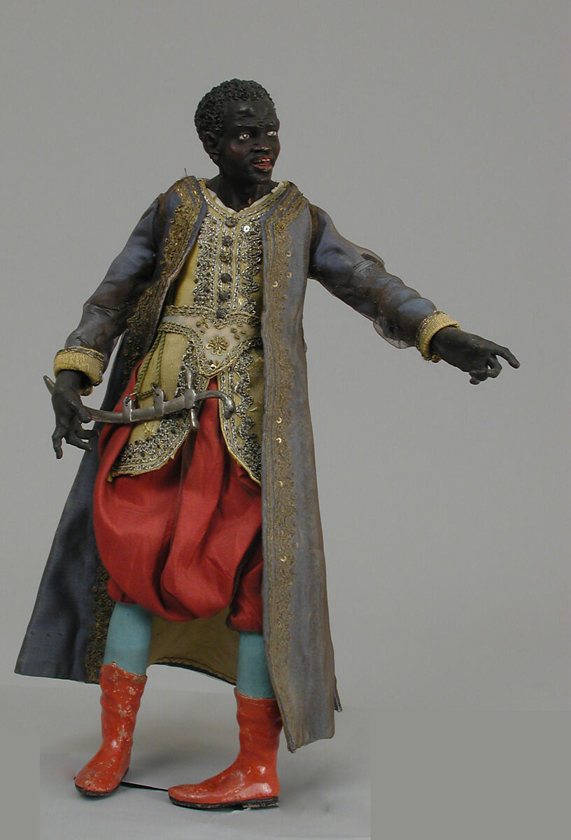 Black king, Polychromed terracotta head and wooden limbs; body of wire wrapped in tow; silk and satin garments with silver thread and buttons; muslin turban and gilt metal crown, Italian, Naples 