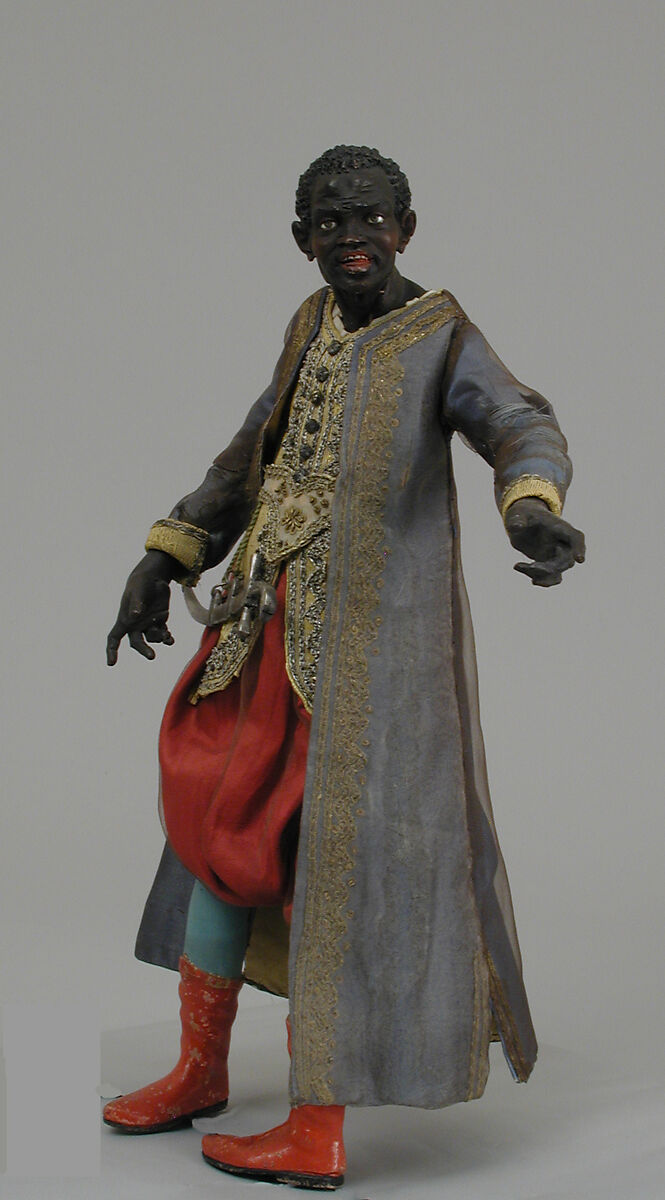 Black king, Polychromed terracotta head and wooden limbs; body of wire wrapped in tow; silk and satin garments with silver thread and buttons; muslin turban and gilt metal crown, Italian, Naples