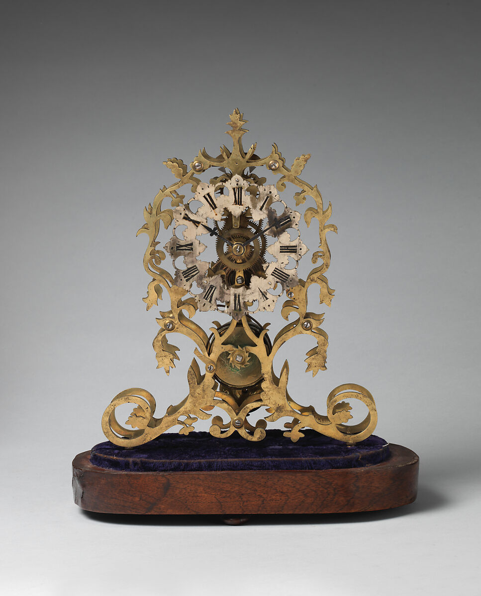 Skeleton clock and key, Brass, partly silvered and painted, velvet, rosewood veneer, glass, British
