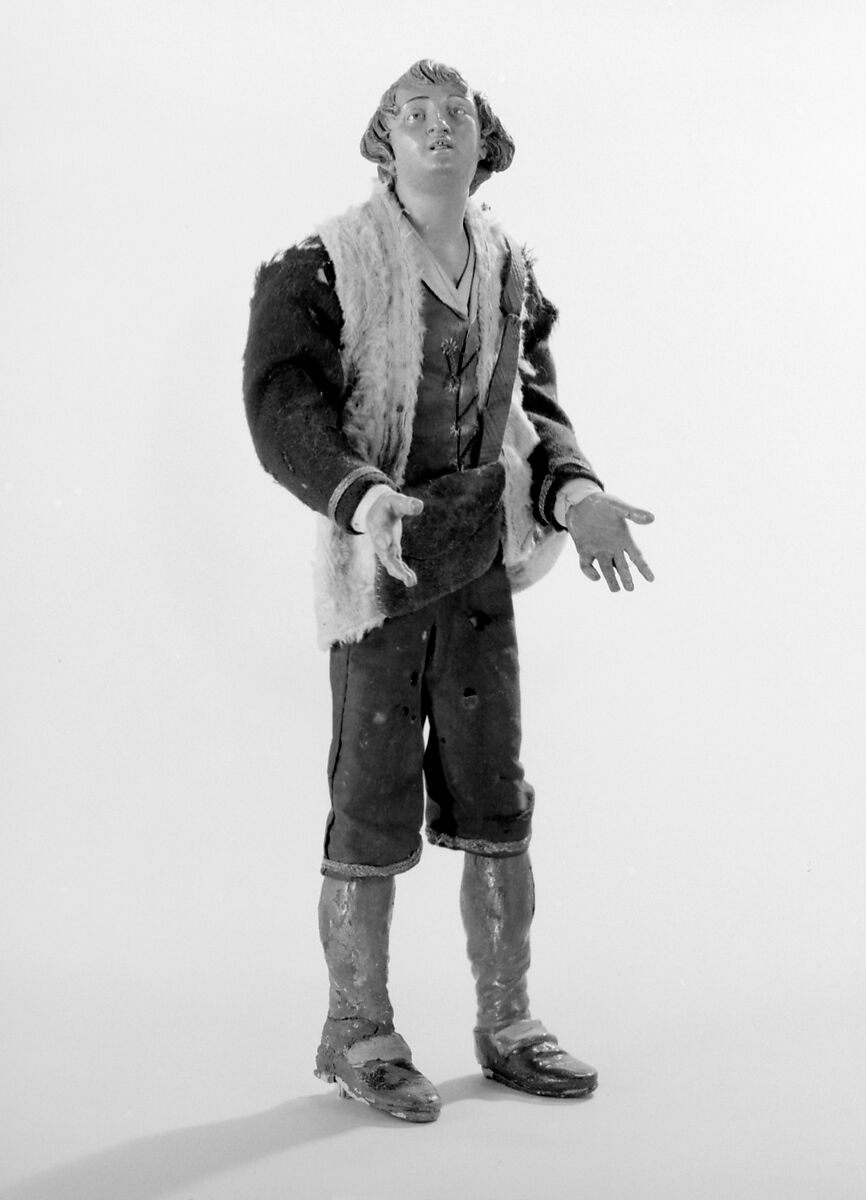 Young man in fur jacket, Polychromed terracotta head; wooden limbs; body of wire wrapped in tow; silk, wool and fur-like garments; leather pouch, Italian, Naples