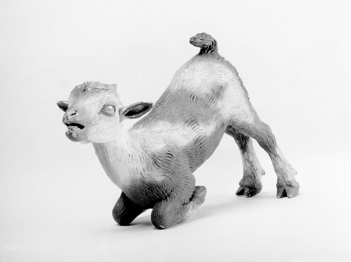 Nursing kid, Polychromed terracotta body with wooden ears and rear legs, Italian, Naples