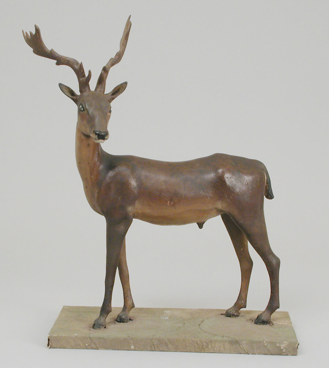 Antlered buck, Polychromed terracotta body; wooden legs and horns; glass eyes, Italian, Naples 