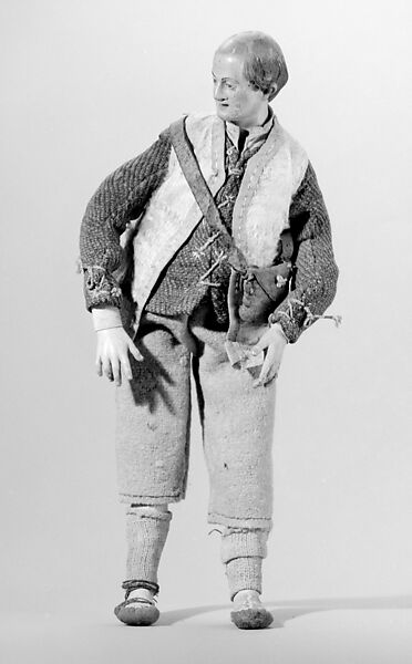Shepherd with leather pouch, Polychromed terracotta head; wooden limbs; body of wire wrapped in tow; wool, linen and burlap garments; leather pouch, Italian, Naples