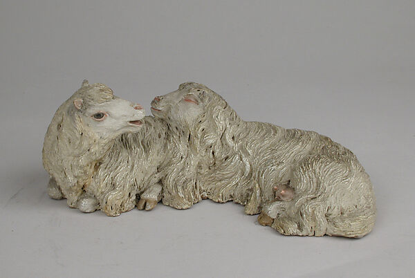 Pair of reclining sheep, Polychromed terracotta body with glass eyes, Italian, Naples 