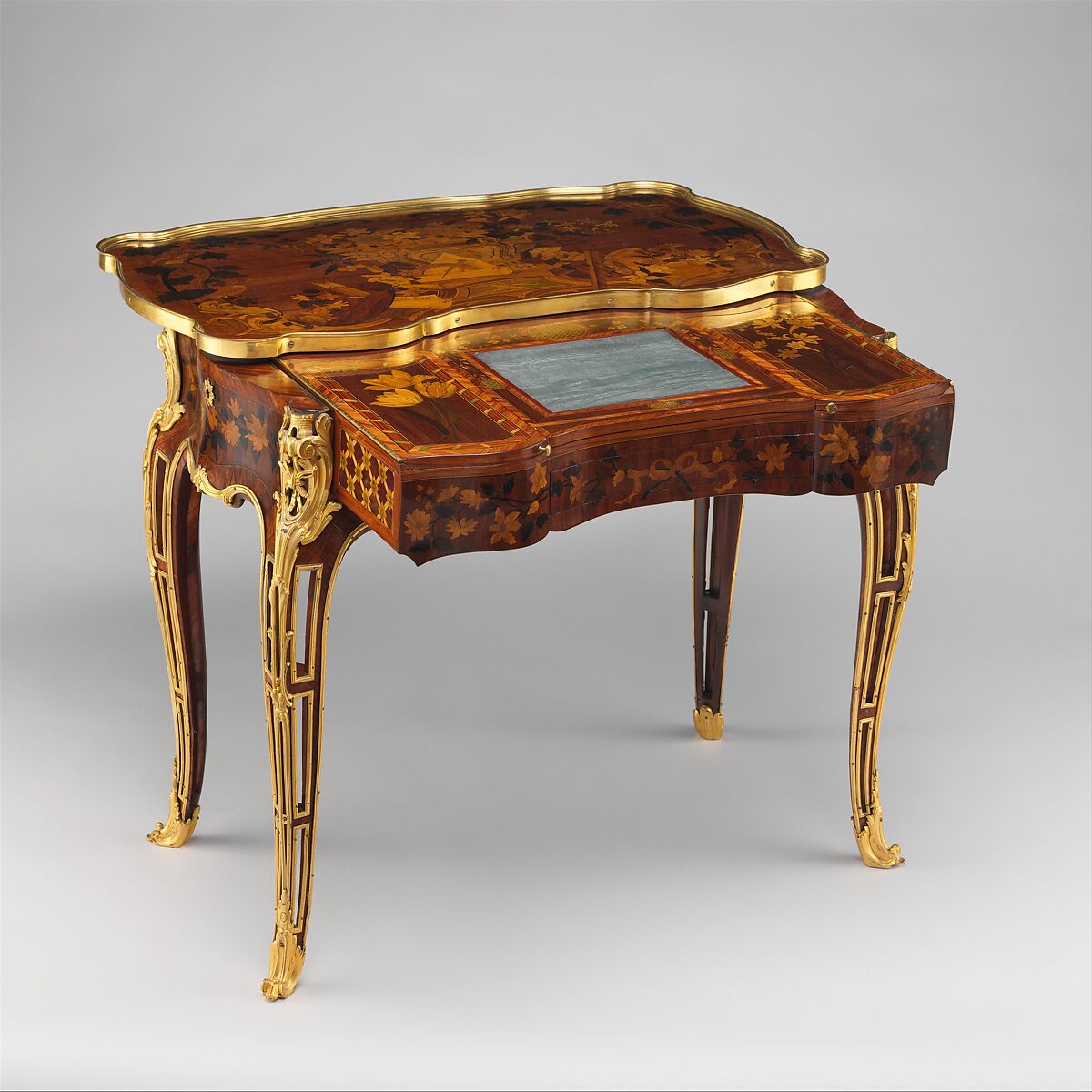Mechanical table, Jean-François Oeben (French, born Germany, Heisenberg 1721–1763 Paris), Oak veneered with mahogany, kingwood, and tulipwood, with marquetry of mahogany, rosewood, holly, and various other woods; gilt-bronze mounts; imitation Japanese lacquer; replaced silk, French