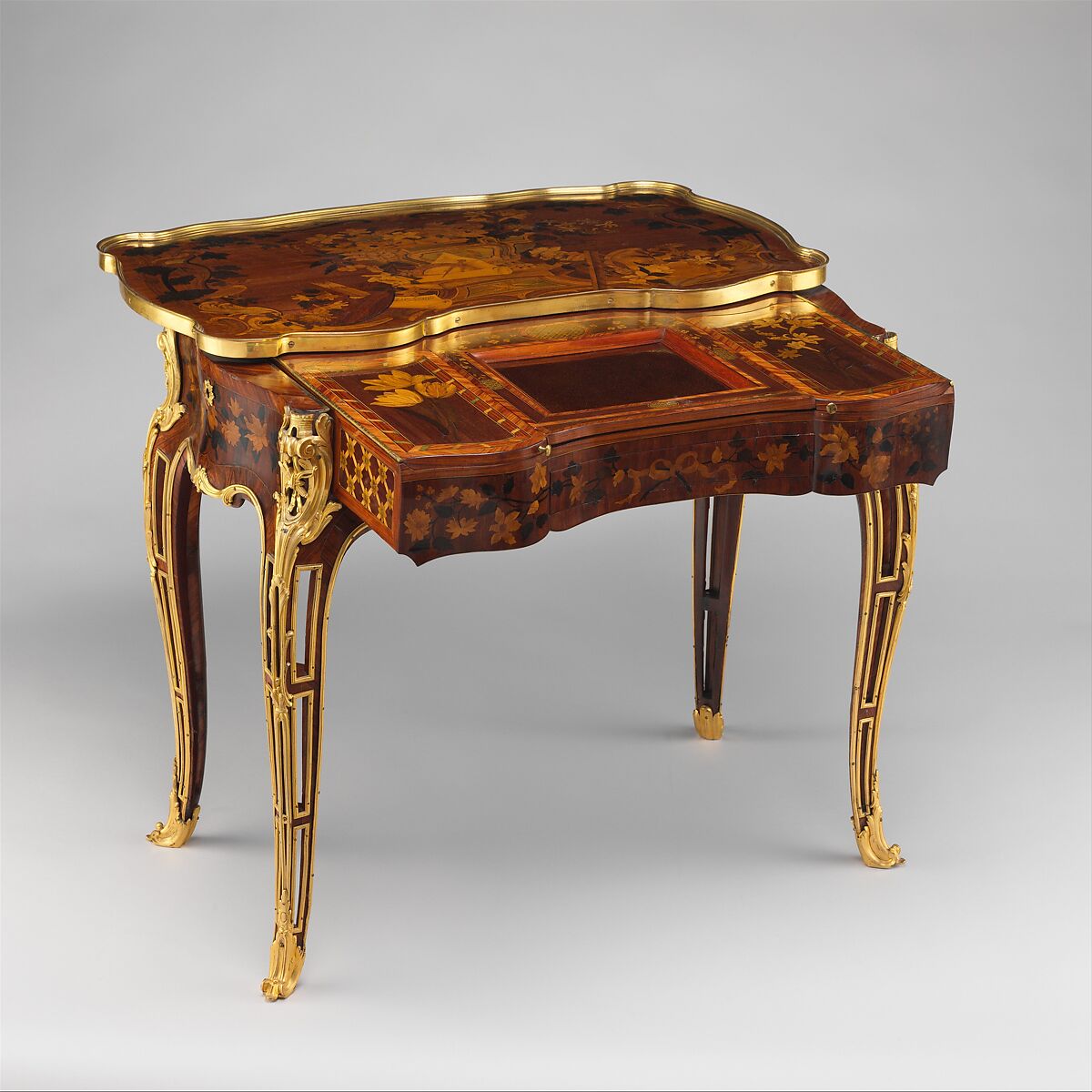 Mechanical table, Jean-François Oeben (French, born Germany, Heisenberg 1721–1763 Paris), Oak veneered with mahogany, kingwood, and tulipwood, with marquetry of mahogany, rosewood, holly, and various other woods; gilt-bronze mounts; imitation Japanese lacquer; replaced silk, French