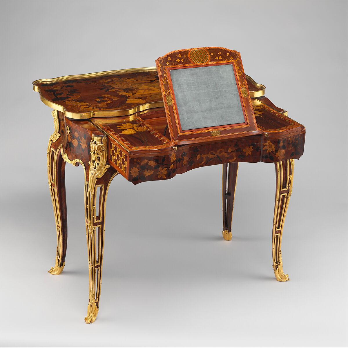 Mechanical table, Jean-François Oeben (French, born Germany, Heisenberg 1721–1763 Paris), Oak veneered with mahogany, kingwood, and tulipwood, with marquetry of mahogany, rosewood, holly, and various other woods; gilt-bronze mounts; imitation Japanese lacquer; replaced silk, French
