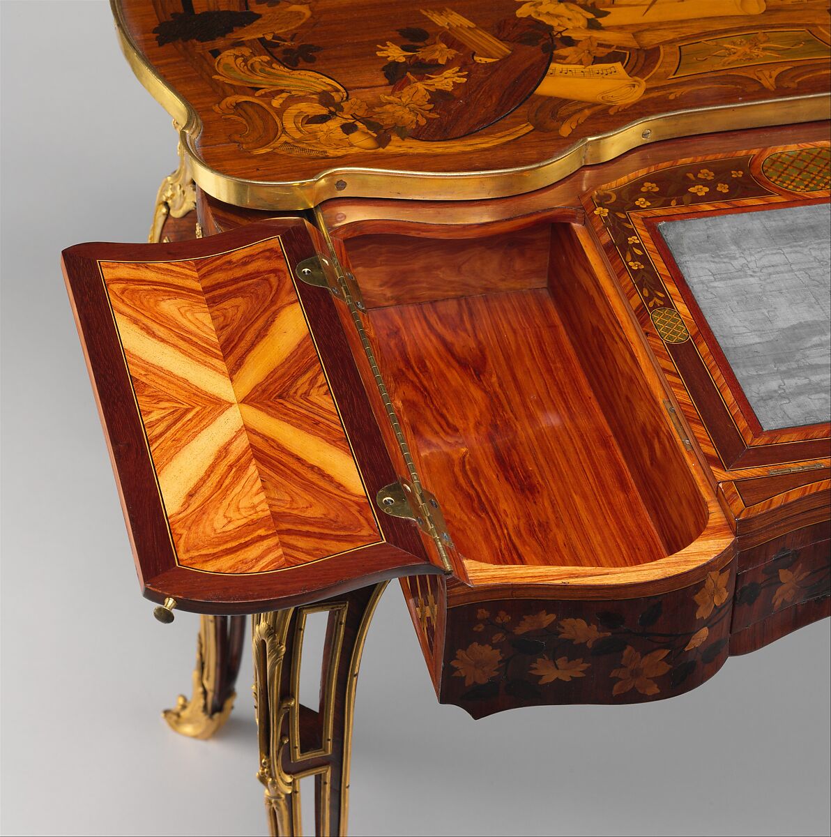 Mechanical table, Jean-François Oeben (French, born Germany, Heisenberg 1721–1763 Paris), Oak veneered with mahogany, kingwood, and tulipwood, with marquetry of mahogany, rosewood, holly, and various other woods; gilt-bronze mounts; imitation Japanese lacquer; replaced silk, French
