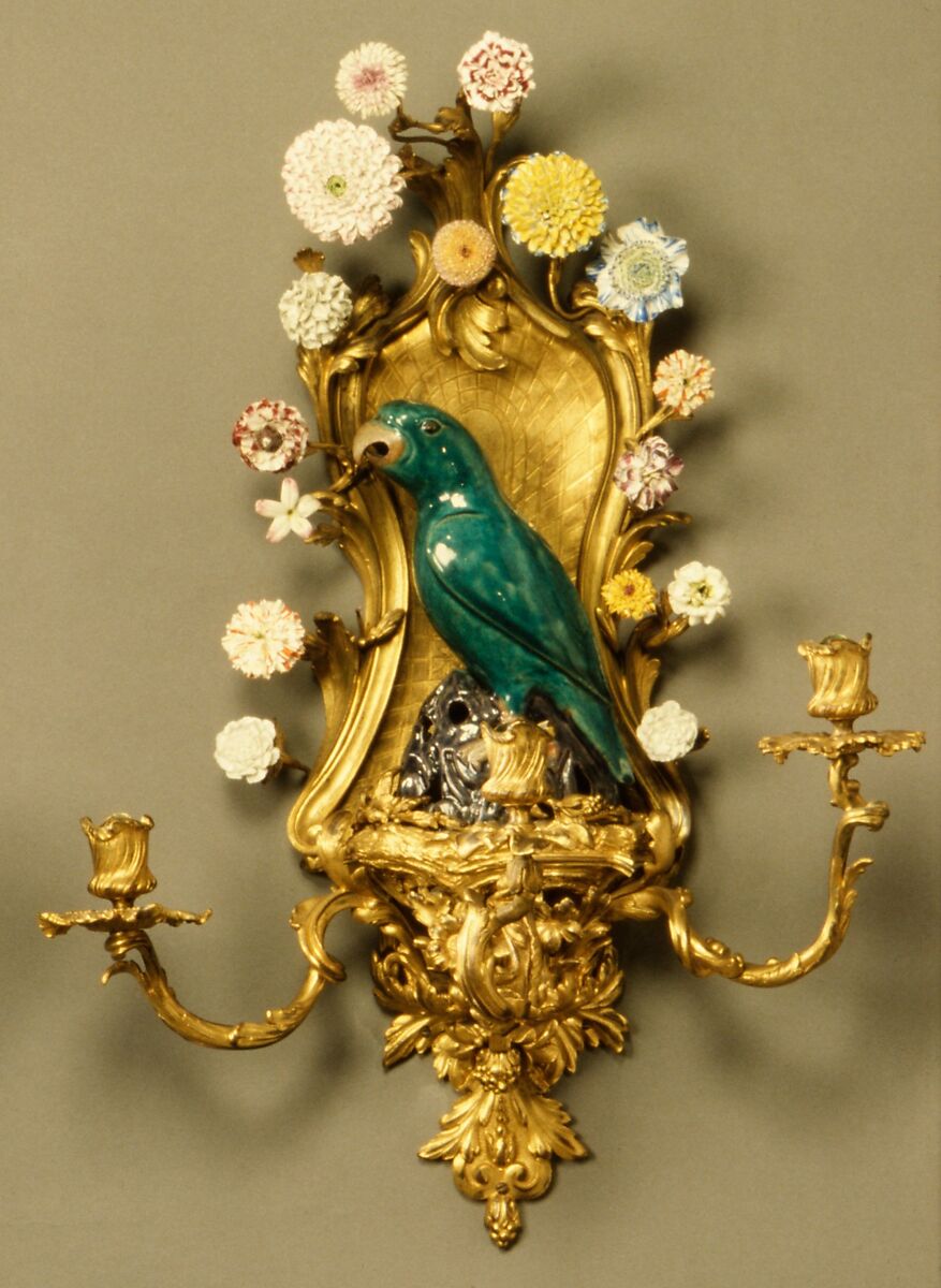 Wall light (one of a pair), Porcelain flowers by Vincennes Manufactory (French, ca. 1740–1756), Glazed biscuit Chinese porcelain parrots of K'ang Hsi period; soft-paste Vincennes porcelain flowers; 19th century hard-paste flowers; gilt bronze, French, Vincennes and Chinese
