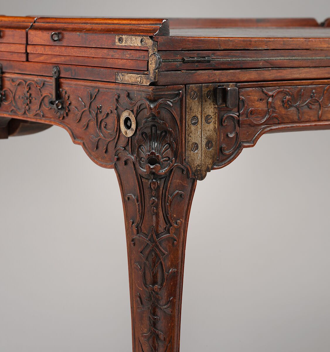 Traveling table (table de voyage or table pliante), Carved walnut; gilt-bronze mounts; steel hinges; linings of felt and leather, French