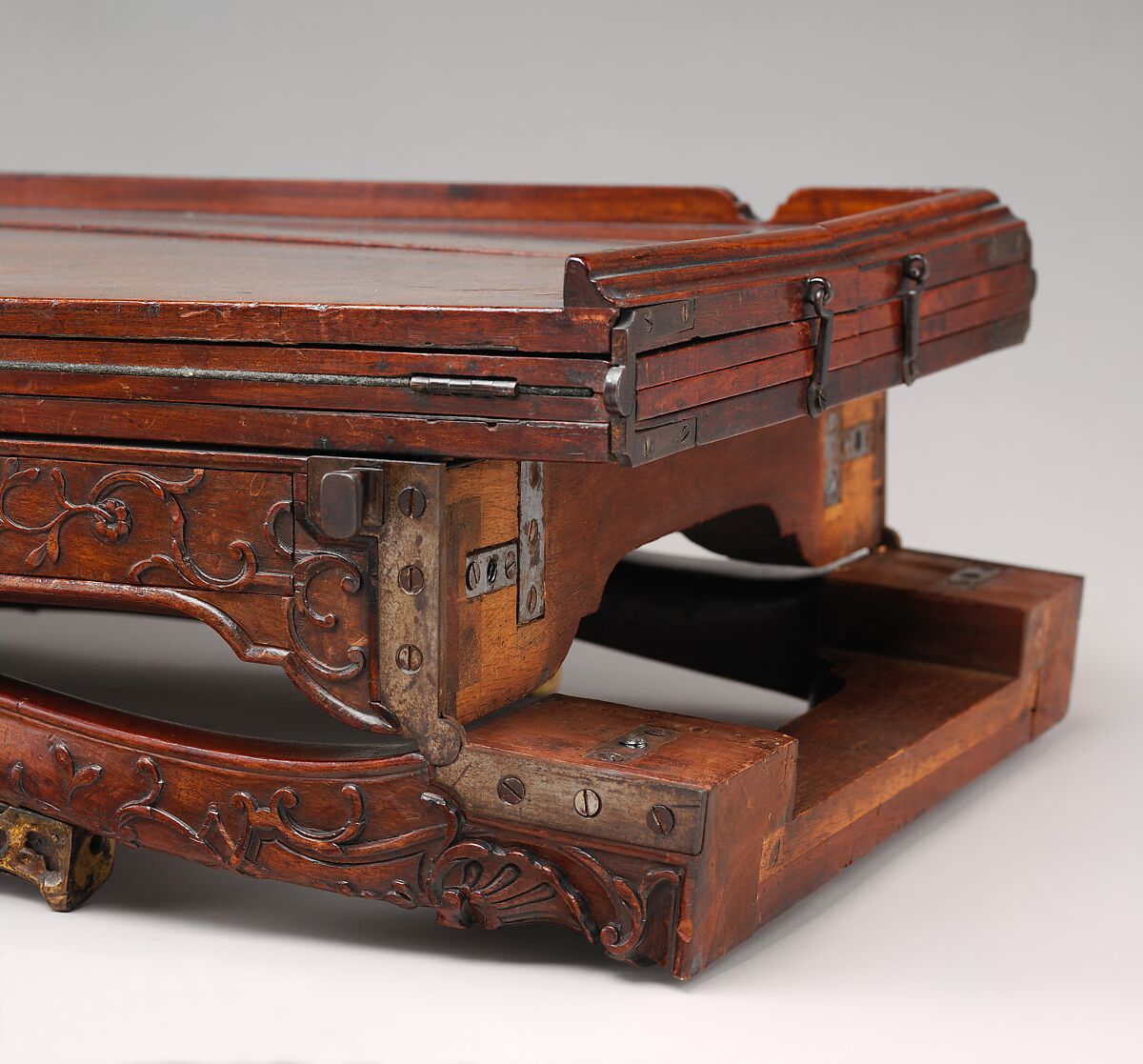 Traveling table (table de voyage or table pliante), Carved walnut; gilt-bronze mounts; steel hinges; linings of felt and leather, French