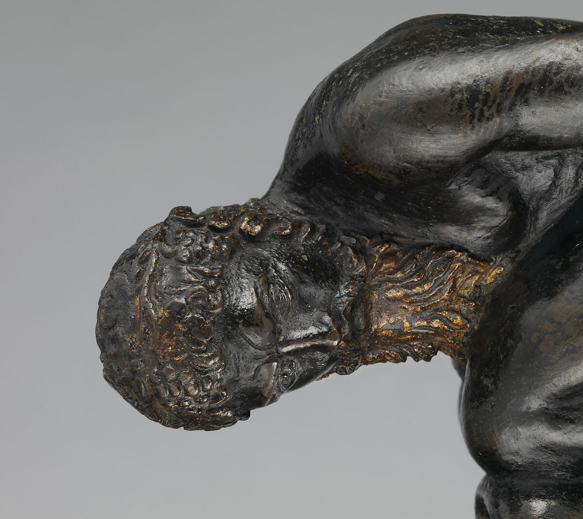 Oil lamp in the form of a bearded athlete balanced on his knees, Agostino Zoppo (Italian, ca. 1520–1572), Bronze, partially oil-gilt, Italian, Padua