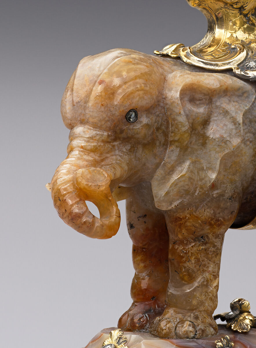 Miniature clock in the form of an elephant supporting a watch case, Agate, heliotrope, gold and diamonds, possibly German, Dresden